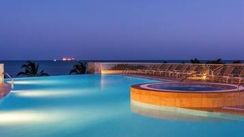 4 outdoor pools, open 9:00 AM to 7:00 PM, pool umbrellas, sun loungers