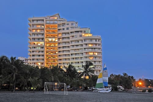 On the beach, free beach cabanas, sun loungers, beach towels