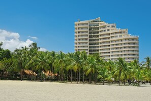 On the beach, free beach cabanas, sun loungers, beach towels