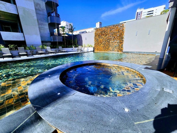 Indoor pool, open 10:00 AM to 10:00 PM, pool umbrellas, sun loungers