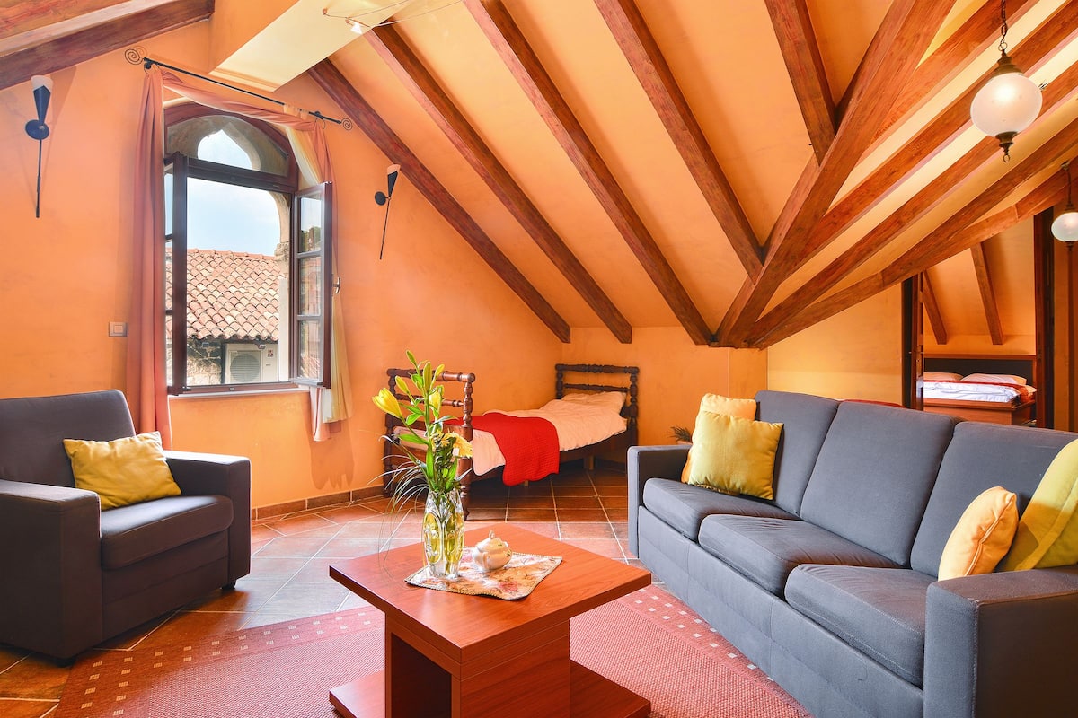 family suite, 2 bedrooms, city view | living area | plasma tv, dvd player