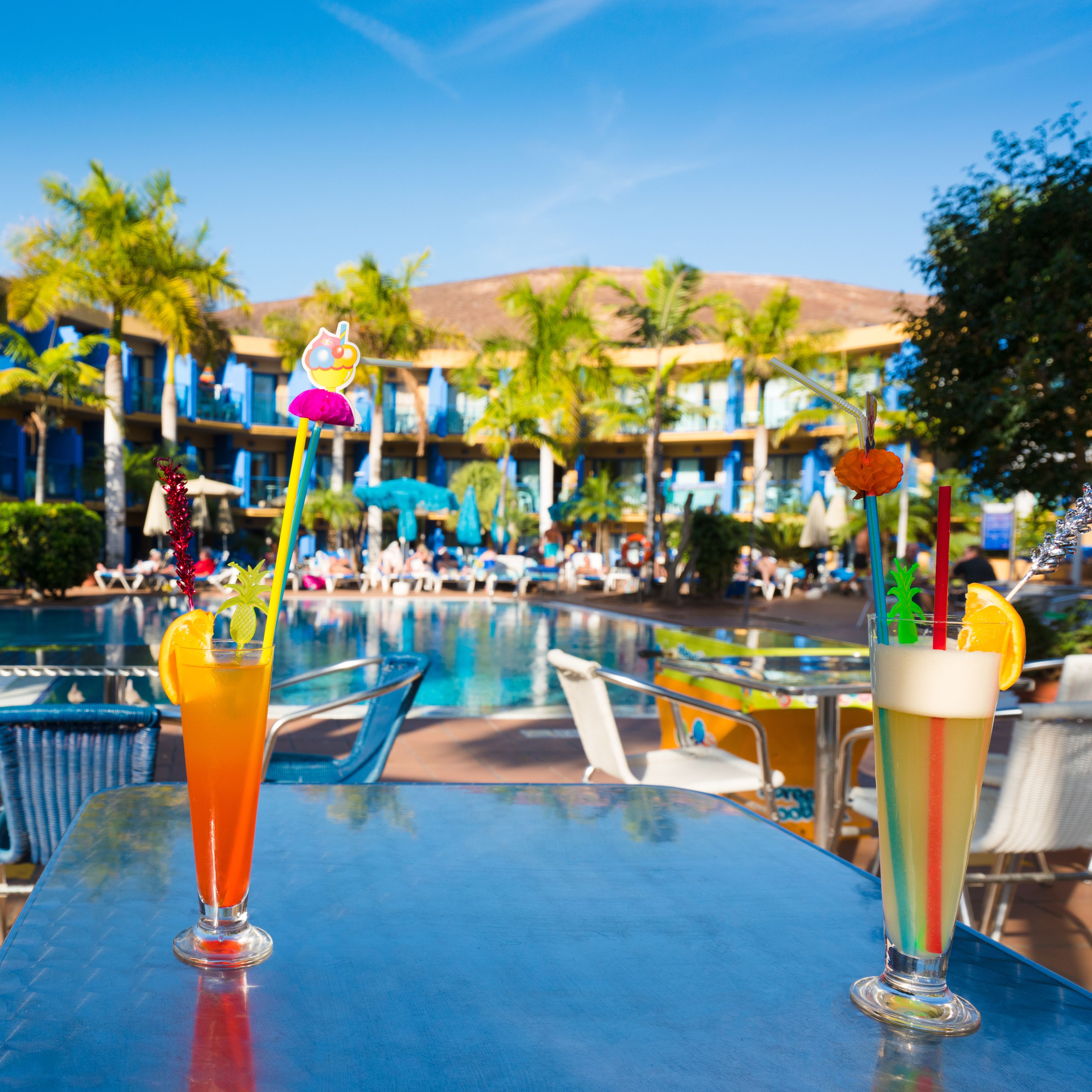 Outdoor pool, open 10:00 AM to 6:00 PM, pool umbrellas, pool loungers