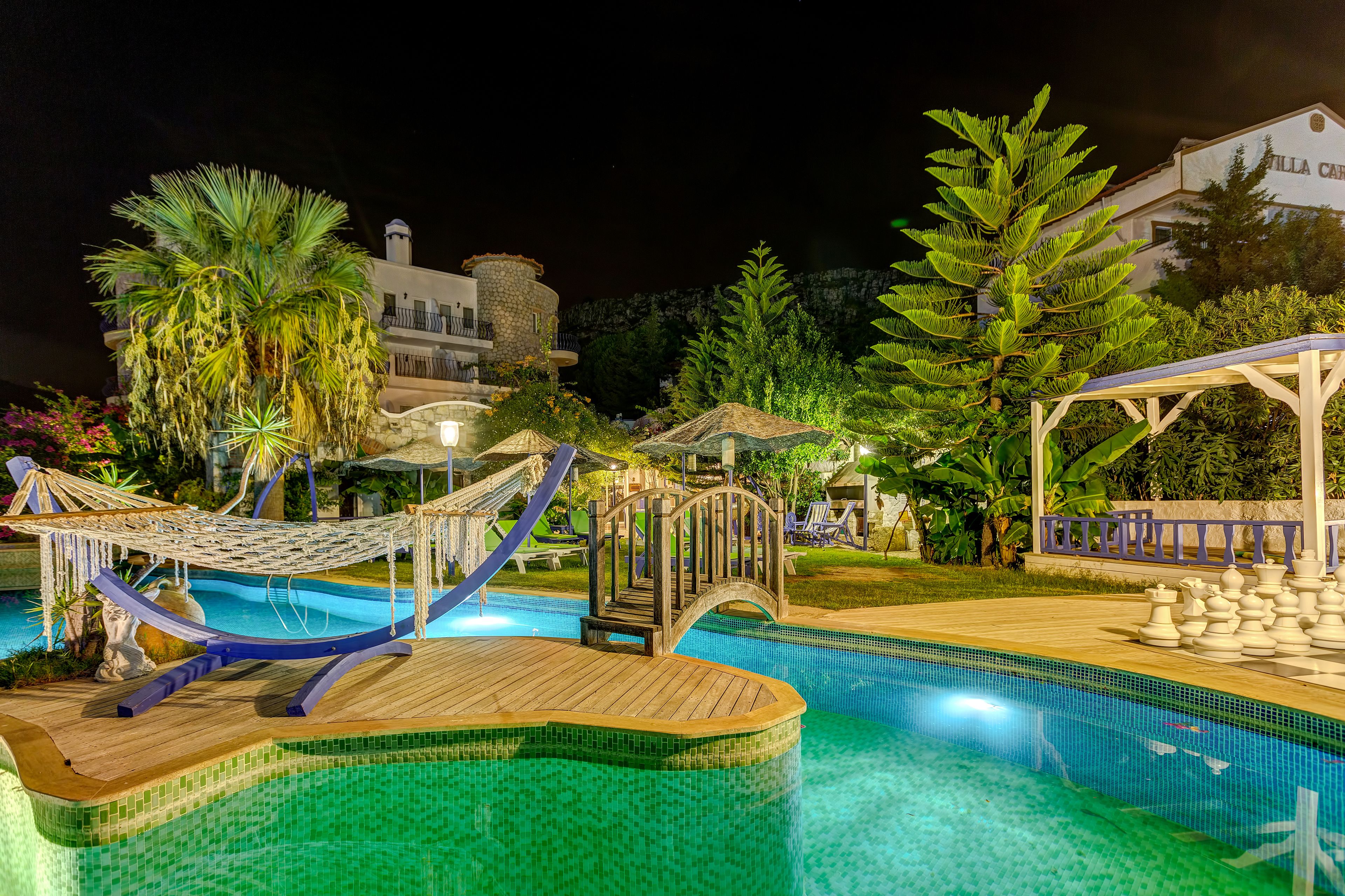 outdoor pool, pool umbrellas, pool loungers