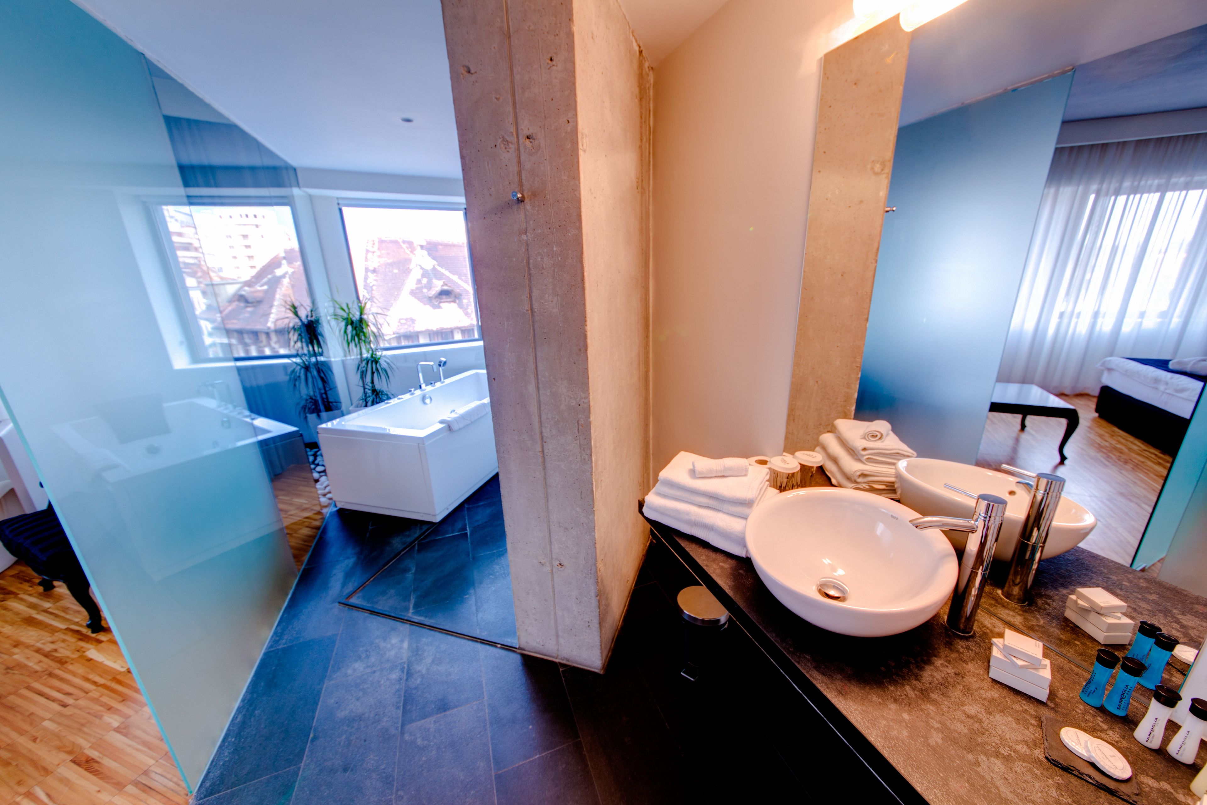 rainfall showerhead, designer toiletries, hair dryer, bathrobes