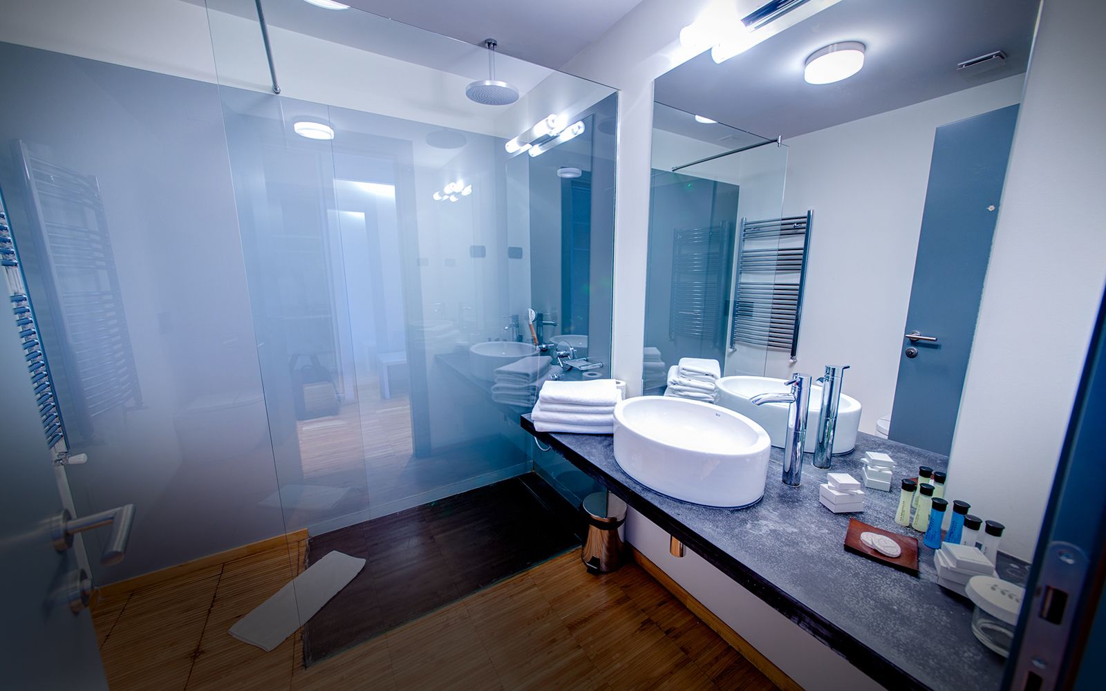 rainfall showerhead, designer toiletries, hair dryer, bathrobes