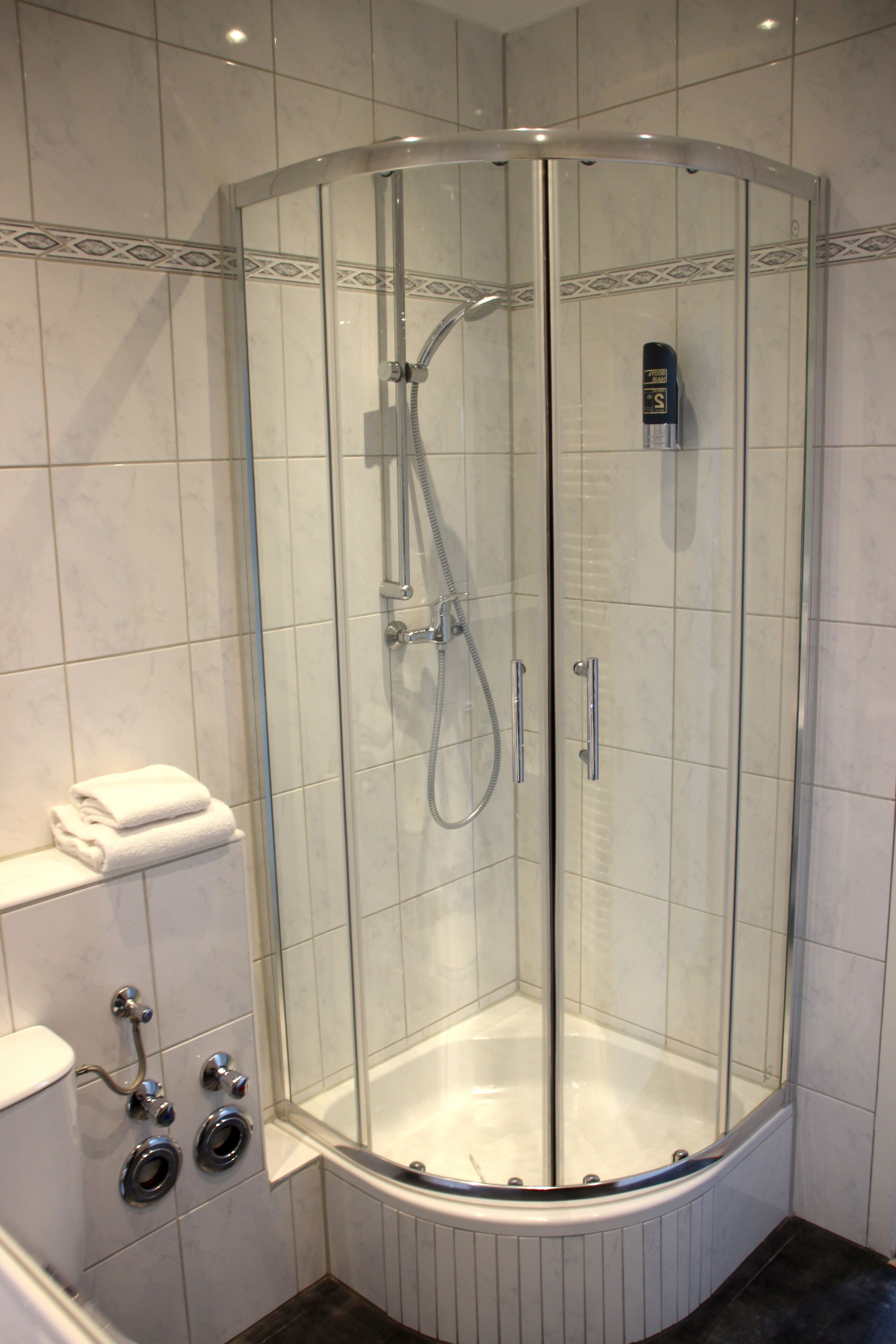 basic studio | bathroom | shower, free toiletries, hair dryer, towels