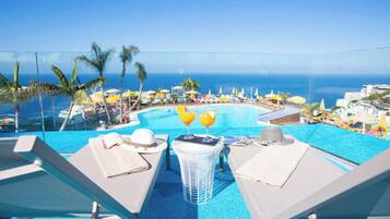 2 outdoor pools, pool umbrellas, sun loungers