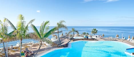 2 outdoor pools, pool umbrellas, sun loungers