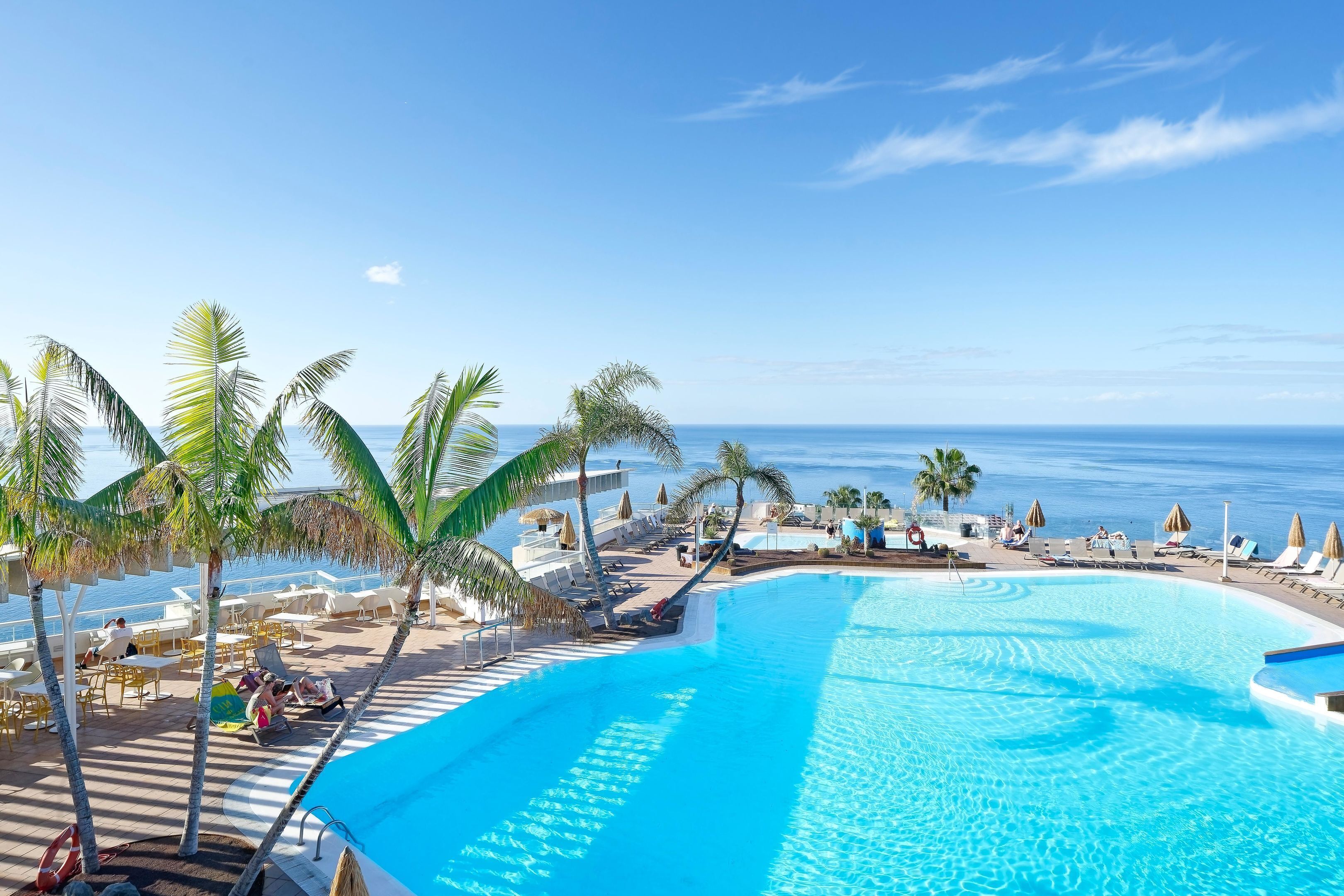 2 outdoor pools, open 9:00 AM to 5:00 PM, pool umbrellas, sun loungers