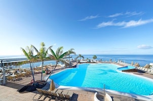 2 outdoor pools, open 9:00 AM to 5:00 PM, pool umbrellas, pool loungers