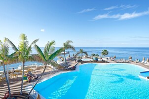 2 outdoor pools, open 9:00 AM to 5:00 PM, pool umbrellas, pool loungers