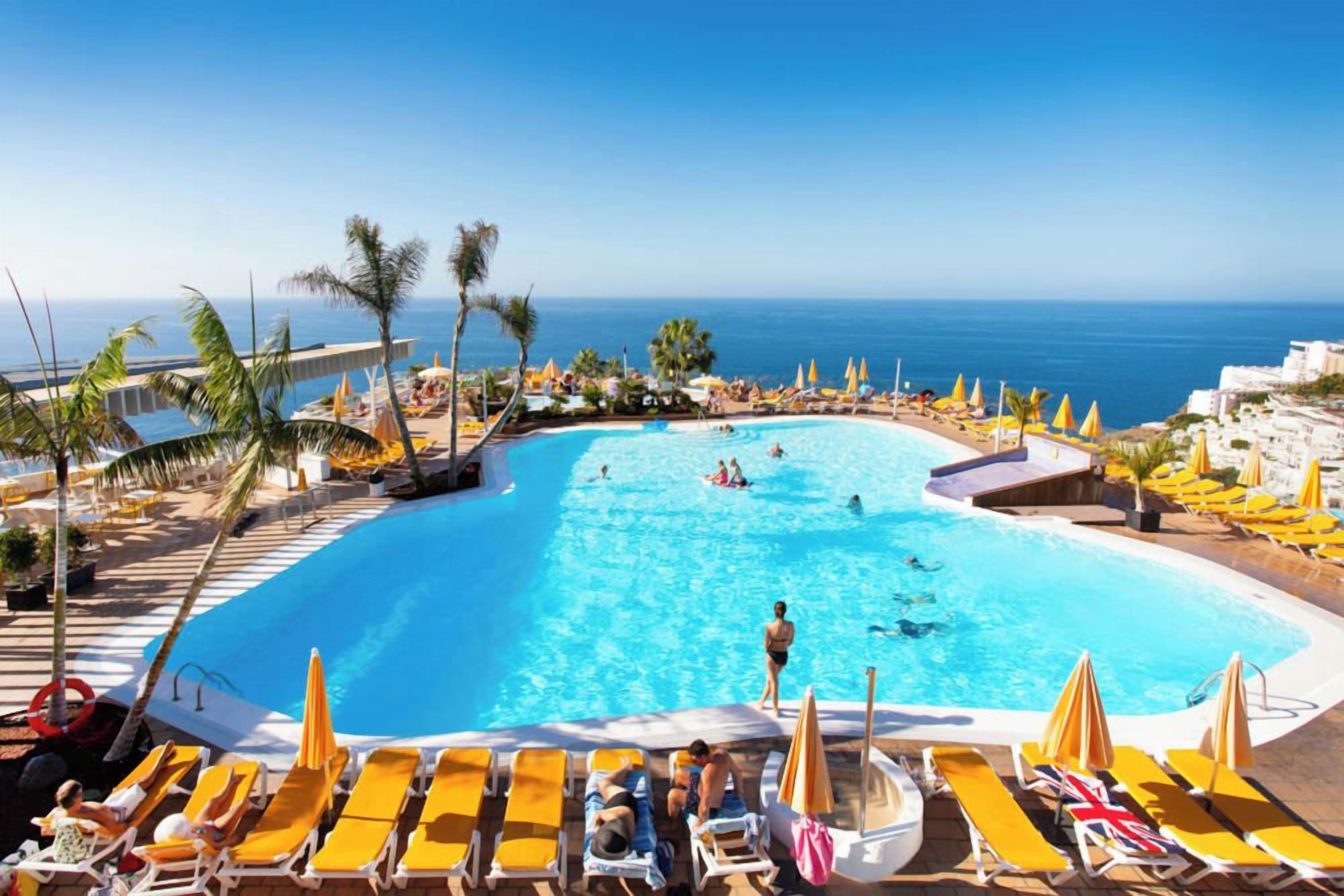 2 outdoor pools, pool umbrellas, sun loungers