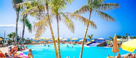 2 outdoor pools, pool umbrellas, pool loungers