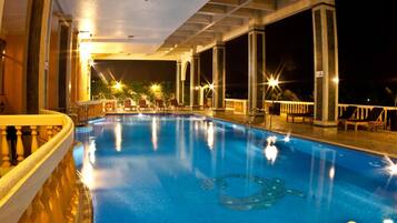 Indoor pool, outdoor pool, open 7 AM to 8 PM, pool umbrellas