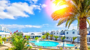 Outdoor pool, pool umbrellas, sun loungers