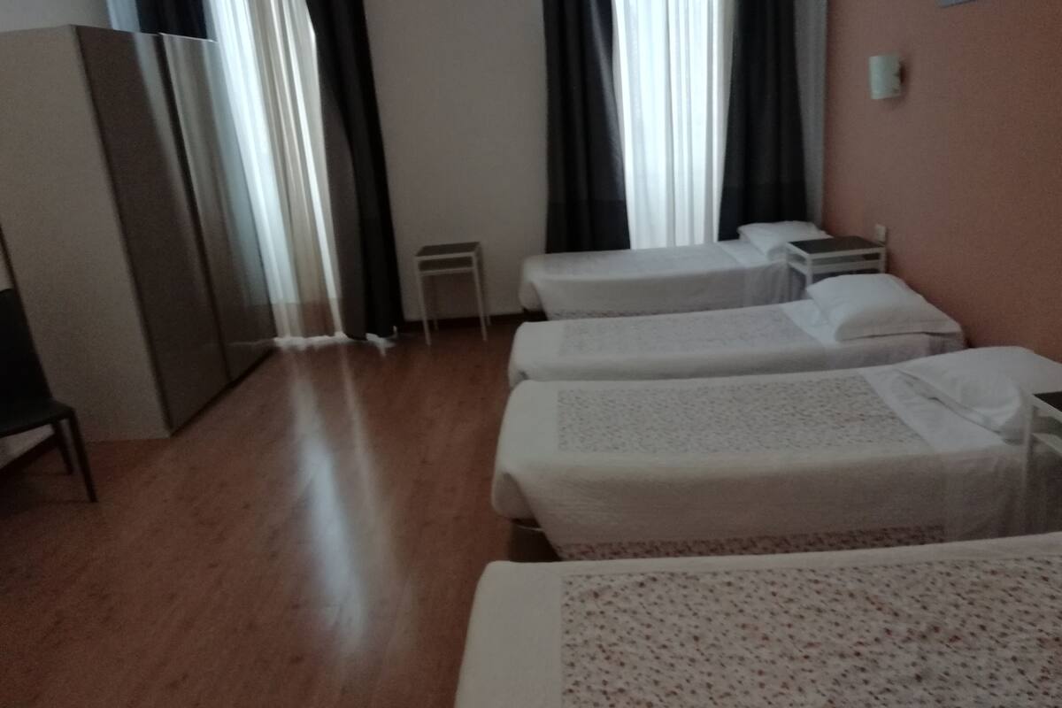 Classic Quadruple Room, 1 Bedroom, Private Bathroom | Desk, blackout drapes, cribs (surcharge), rollaway beds (surcharge)