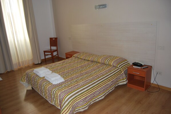 Desk, blackout curtains, cots/infant beds, rollaway beds