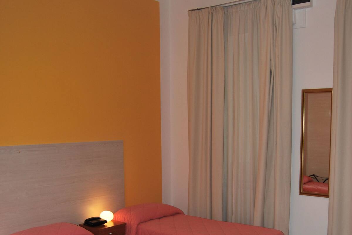 Classic Triple Room, 1 Bedroom, Private Bathroom | Desk, blackout drapes, cribs (surcharge), rollaway beds (surcharge)