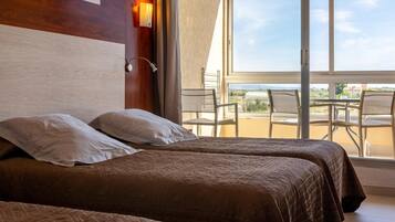 Desk, blackout curtains, free WiFi, bed sheets
