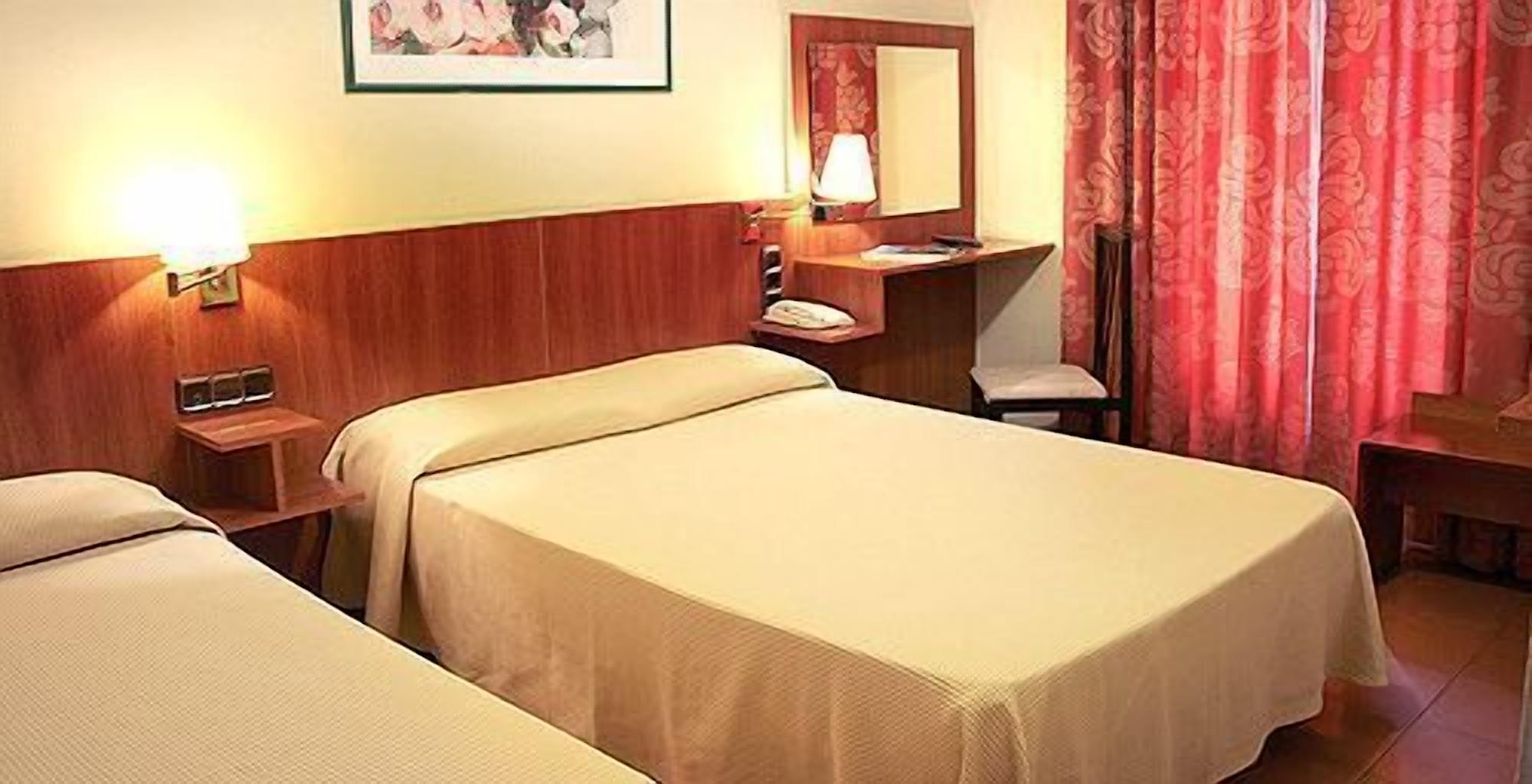 desk, blackout curtains, free cots/infant beds, free wifi