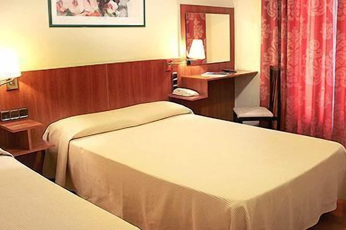 desk, blackout curtains, free cots/infant beds, free wifi