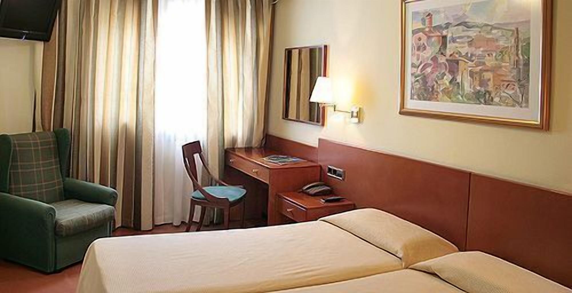 desk, blackout curtains, free cots/infant beds, free wifi