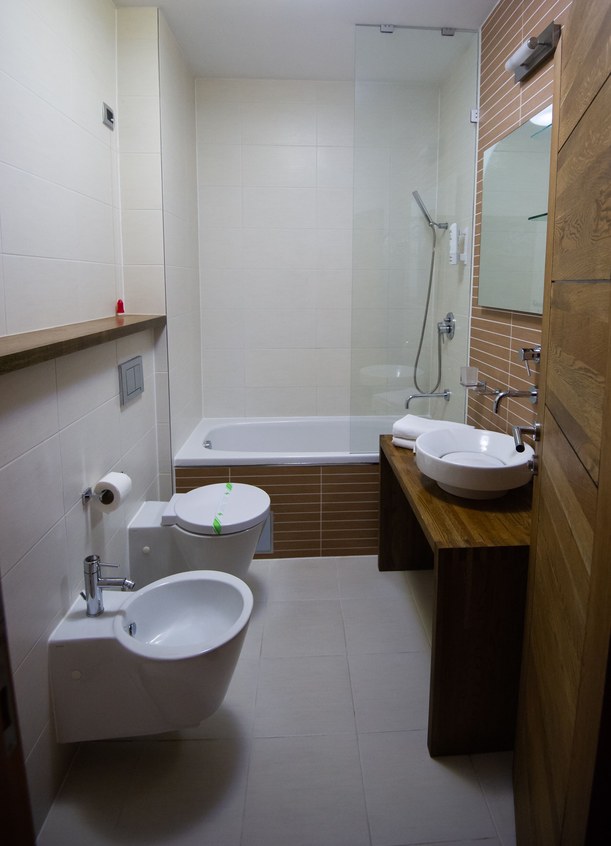 combined shower/bathtub, free toiletries, hair dryer, dressing gowns