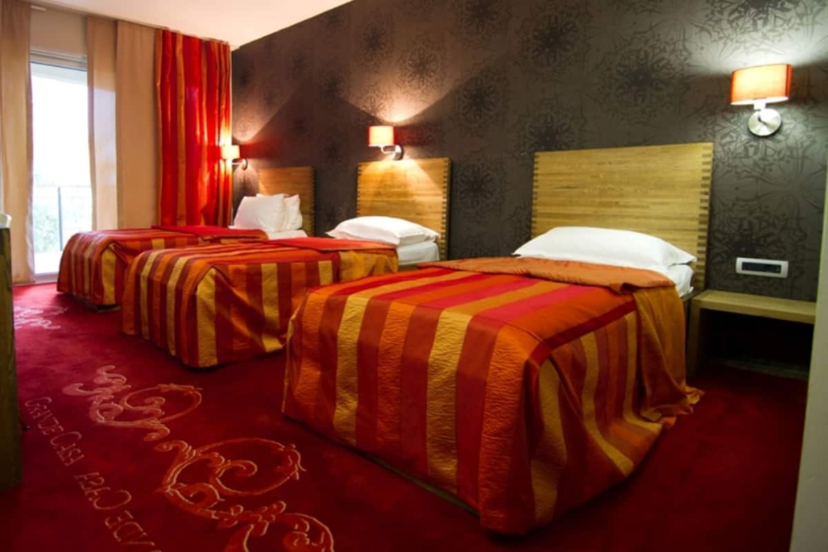 comfort triple room, balcony, resort view | minibar, in-room safe, desk, laptop workspace