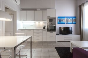 Apartment, 2 Bedrooms | Living area | 48-inch flat-screen TV with digital channels, TV, DVD player - Weflating Eixample (Barcelona)