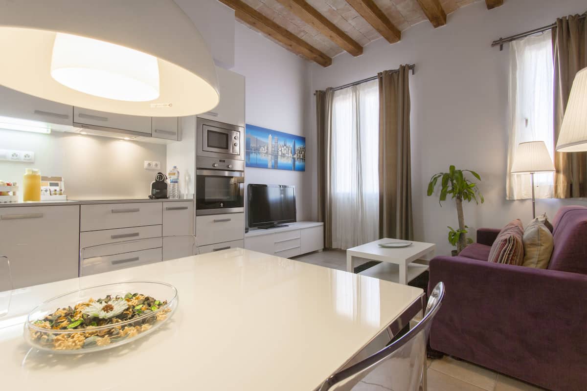 Apartment, 2 Bedrooms | Living room | 48-inch flat-screen TV with digital channels, TV, DVD player