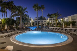 2 outdoor pools, open 10:00 AM to 6:00 PM, pool umbrellas, pool loungers