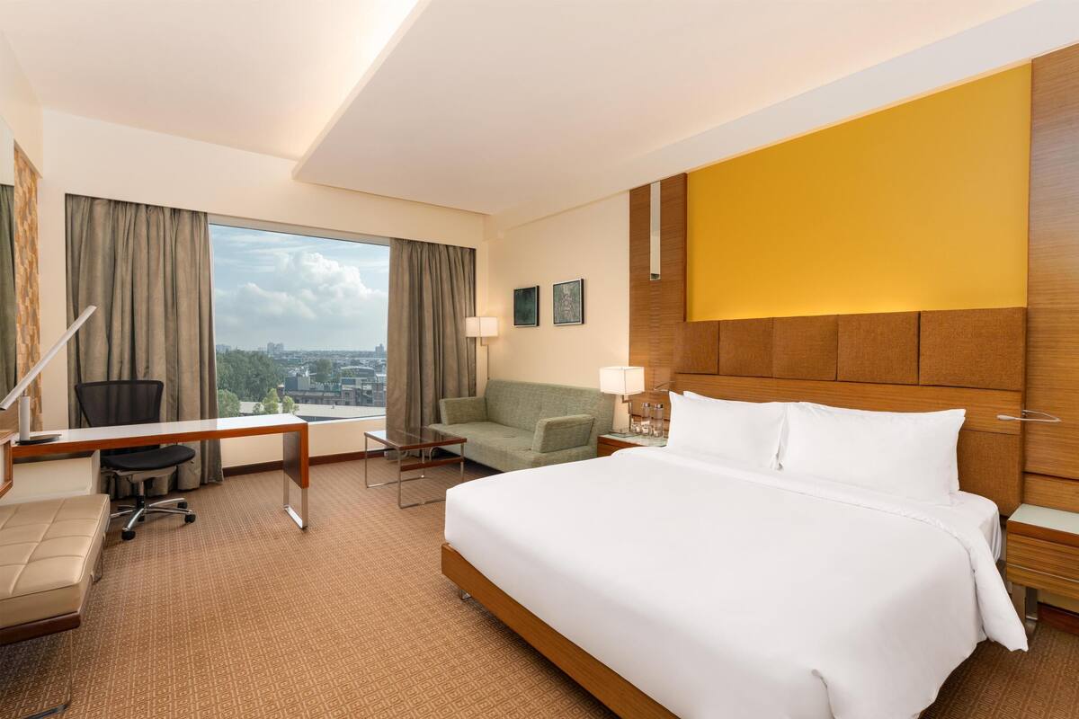 Kamar Bisnis (Business Class) | Seprai premium, selimut bulu angsa, dan tempat tidur Select Comfort