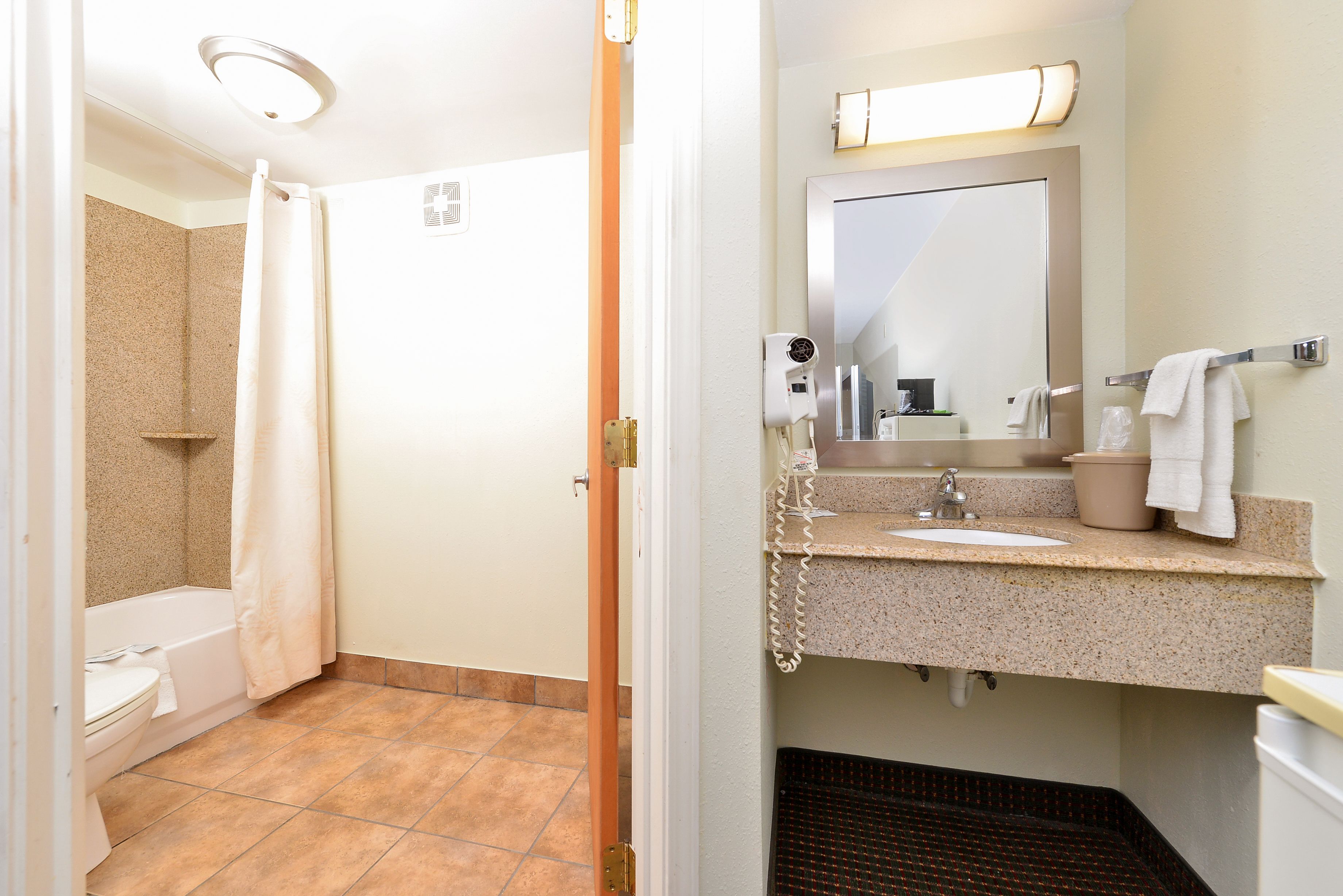 Room, 2 Double Beds, Non Smoking | Bathroom | Hair dryer, towels