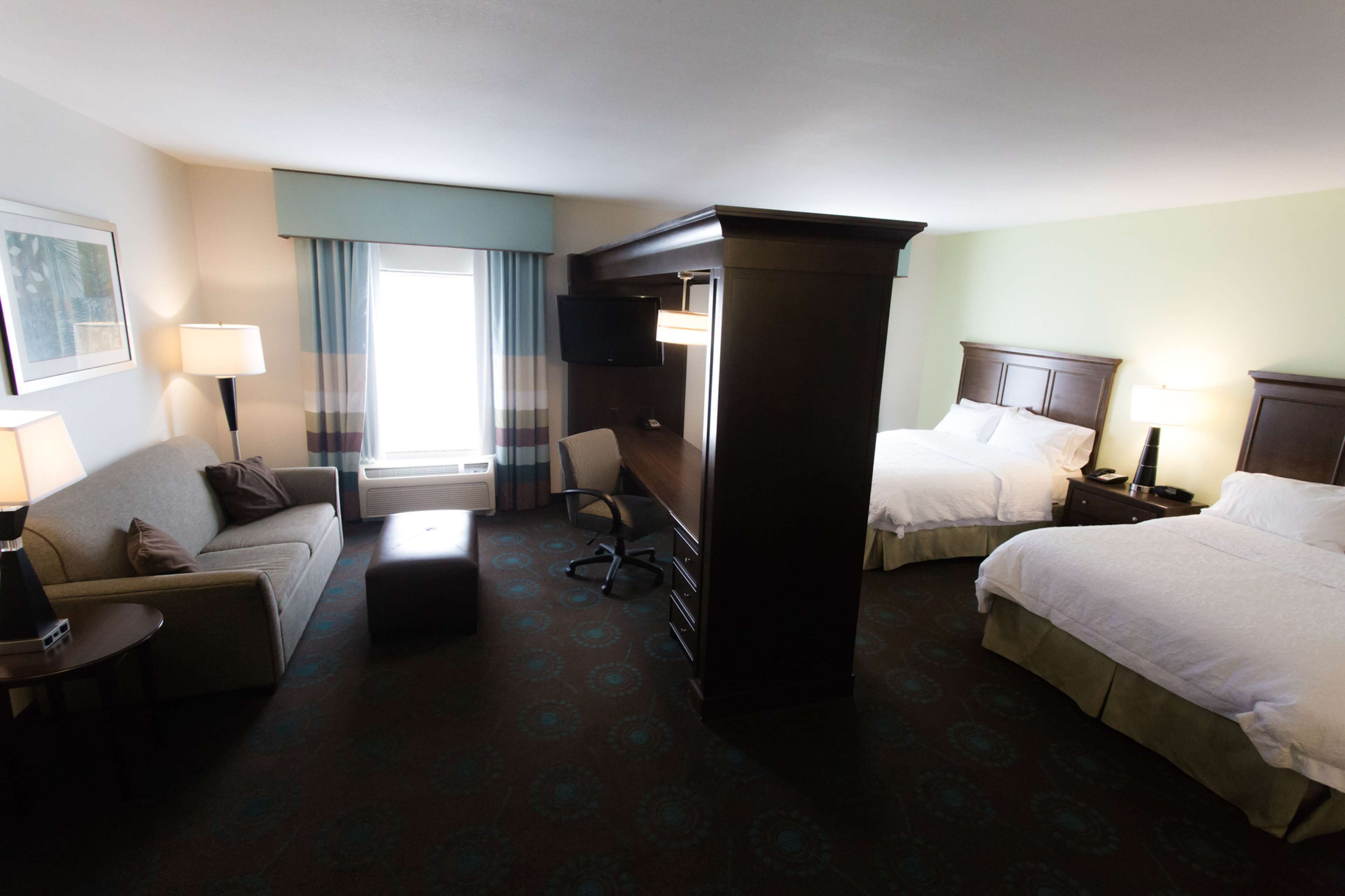 two queen studio suite. | in-room safe, iron/ironing board, free cots/infant beds, free wifi