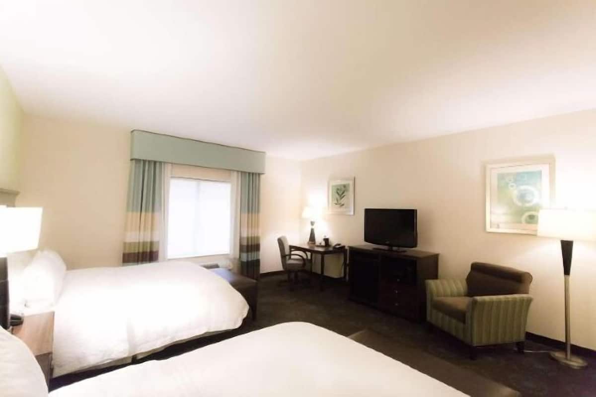 Coffres-forts dans les chambres, fer et planche à repasser