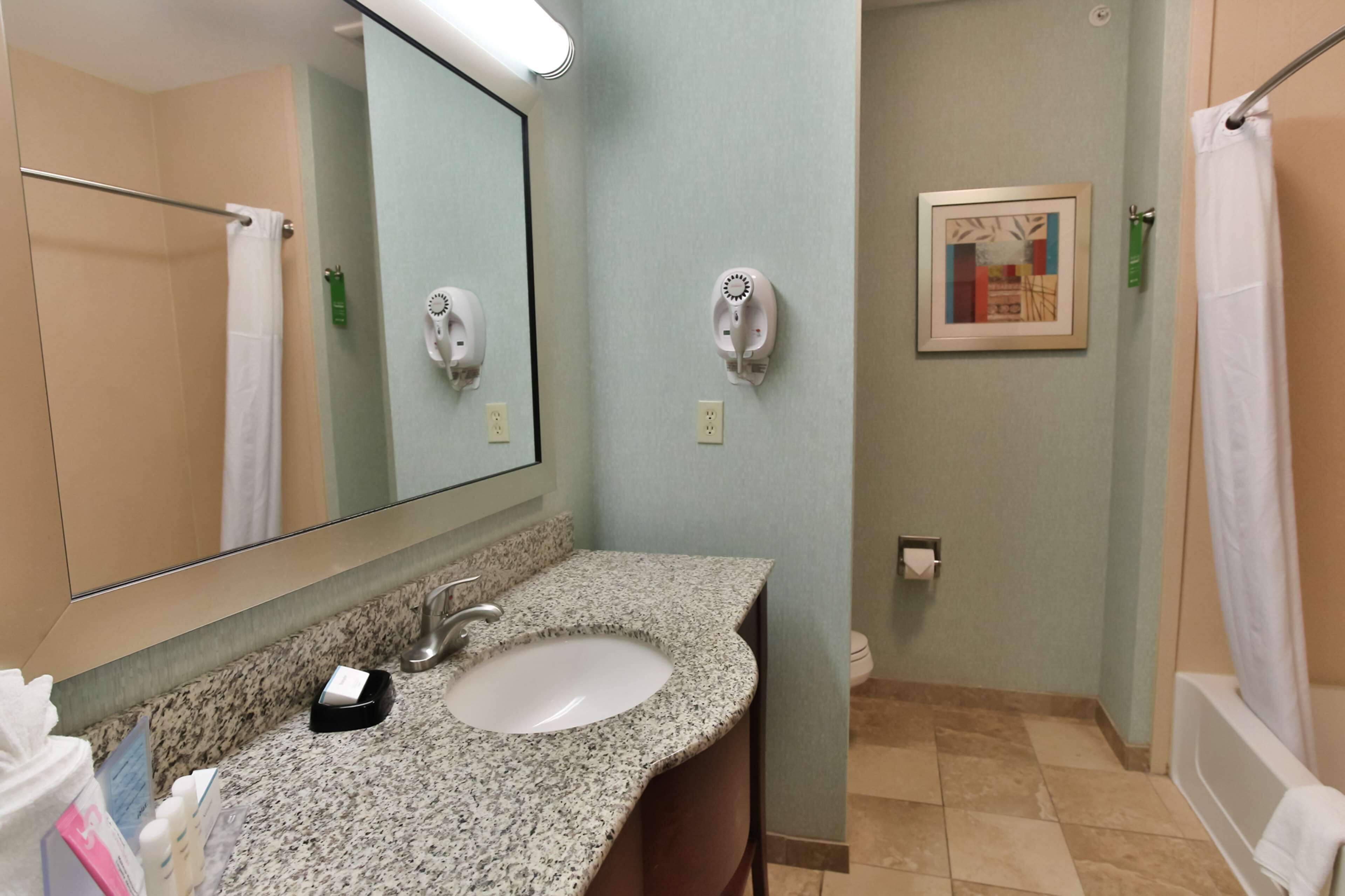two queen studio suite. | bathroom | hair dryer, towels