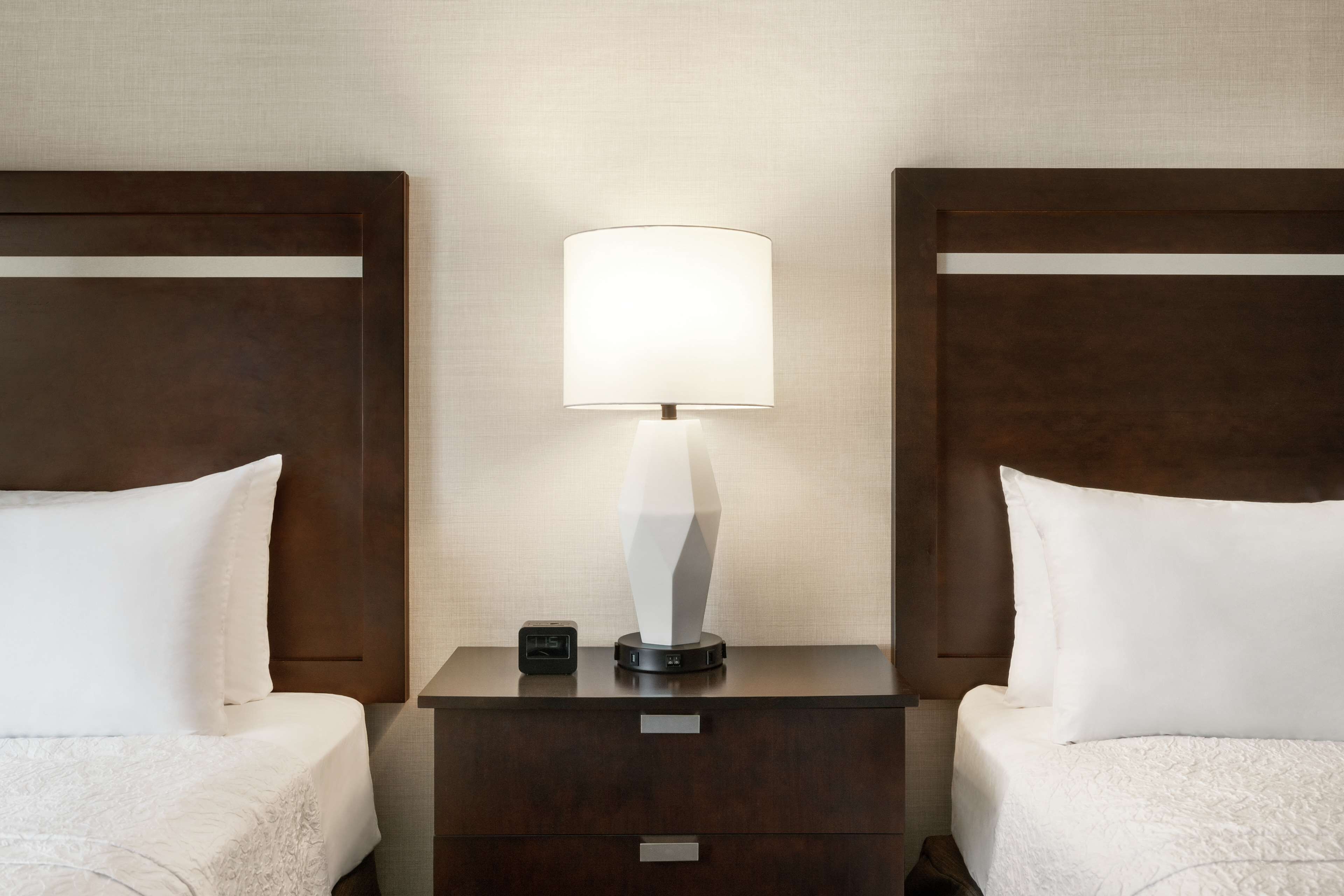 Hypo-allergenic bedding, desk, laptop workspace, blackout curtains