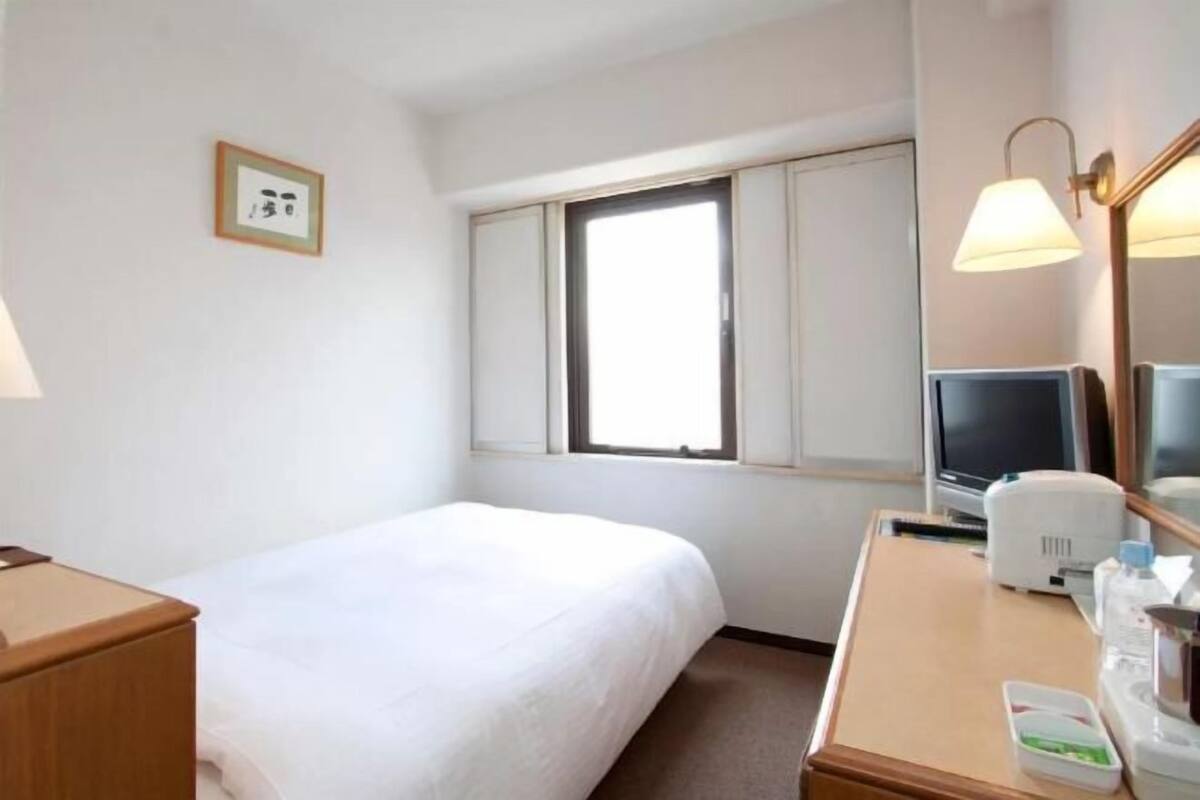 Down comforters, memory foam beds, in-room safe, desk