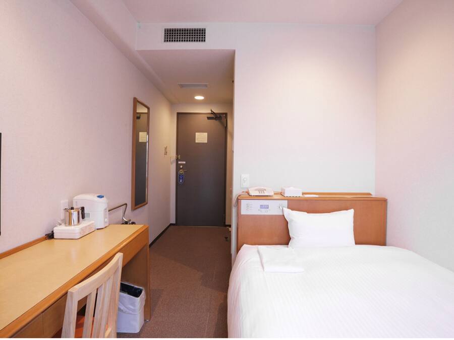 Down comforters, memory foam beds, in-room safe, desk