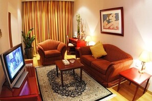 Suite | Área de sala de estar | Televisión 