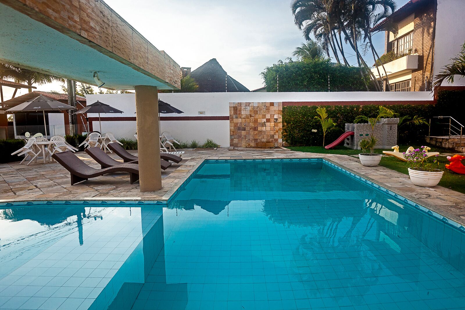 outdoor pool, pool loungers