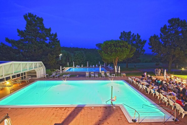 Indoor pool, seasonal outdoor pool, pool umbrellas, pool loungers