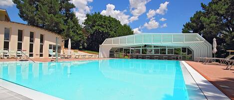 Indoor pool, seasonal outdoor pool, pool umbrellas, sun loungers
