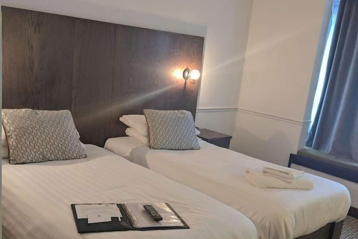 Select Comfort beds, desk, iron/ironing board (on request), WiFi (free)