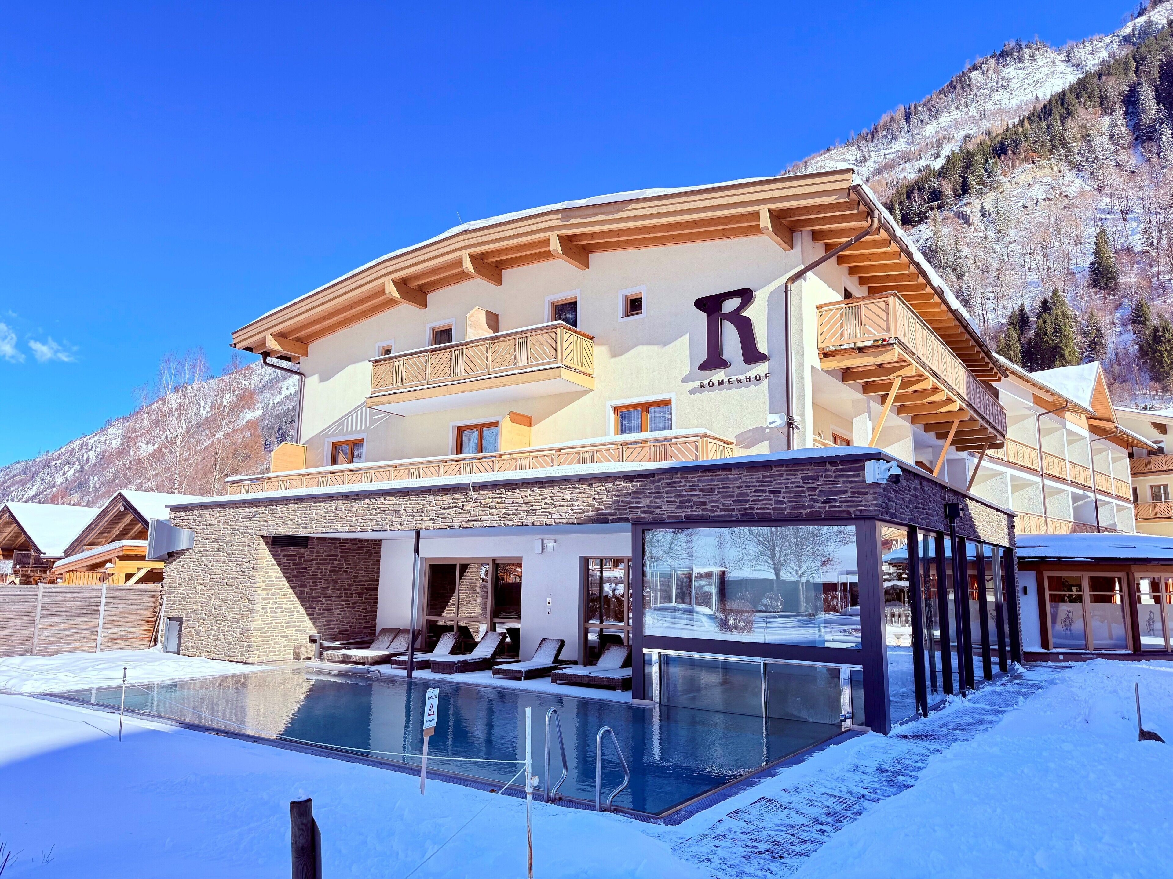 Indoor pool, outdoor pool, open 10:00 AM to 10 PM, pool umbrellas