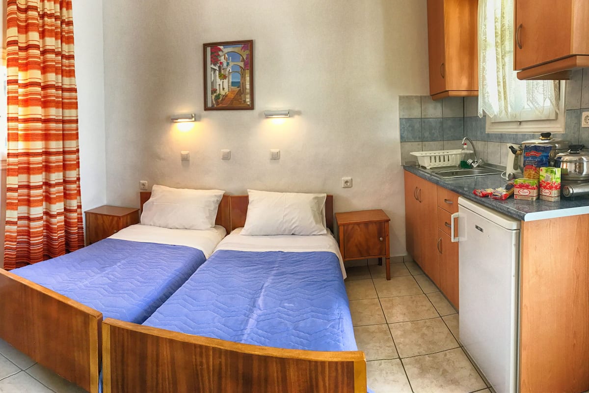 Family Apartment, Garden View | 1 bedroom, in-room safe, bed sheets