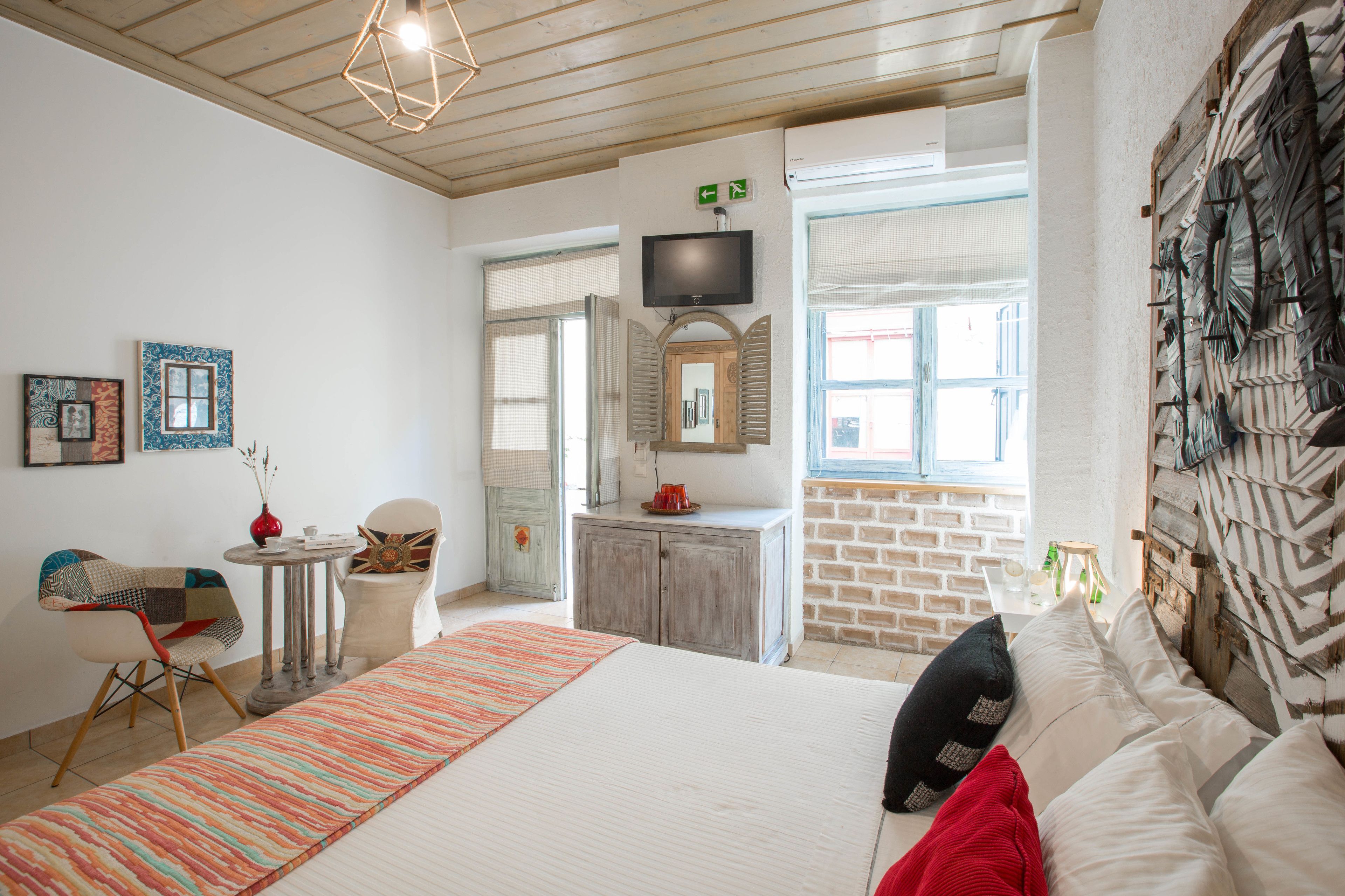 double room, ground floor (groundfloor entrance,amymone building) | 1 bedroom, in-room safe, free wifi, bed sheets