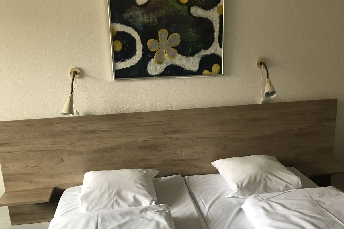 family room | 1 bedroom, pillow-top beds, desk, soundproofing