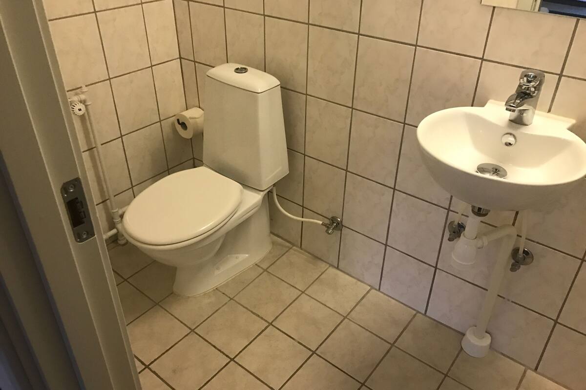 shower, rainfall showerhead, hair dryer, towels