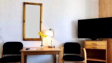 Habitación familiar | Camas con pillow-top, escritorio y insonorización